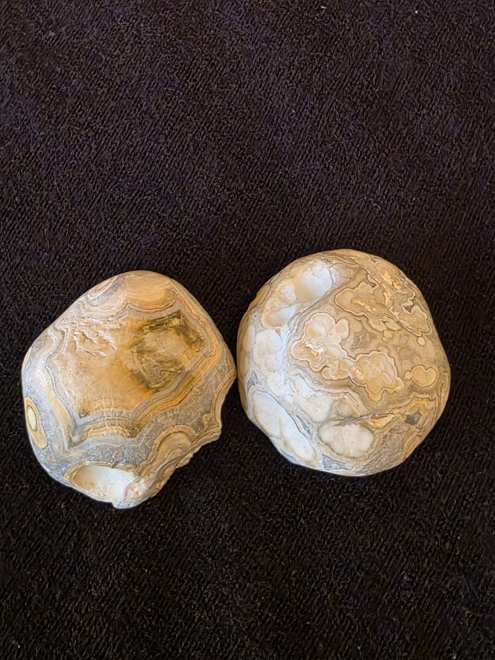 Natural exterior of Lebanese banded agate geode pair №004 showing preserved tan calcareous crust as it was found on the Minieh shoreline.
